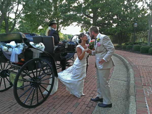 Lovely carriage and just married couple